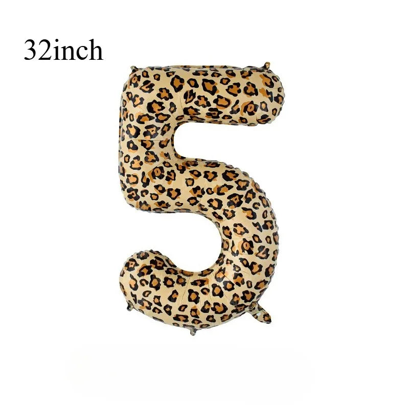 A large, gold leopard print number balloon shaped like the number 5.