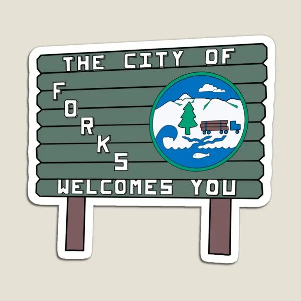 A wooden sign welcomes visitors to the City of Forks, featuring a circular graphic of mountains and water.