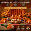 A display of orange marigold flowers and stems used for authentic Día de Reyes decorations.