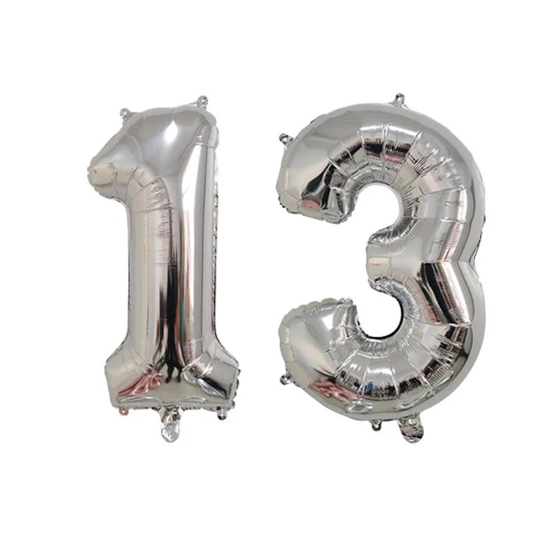 Silver foil number balloon shaped like the number 13 for birthday party decor