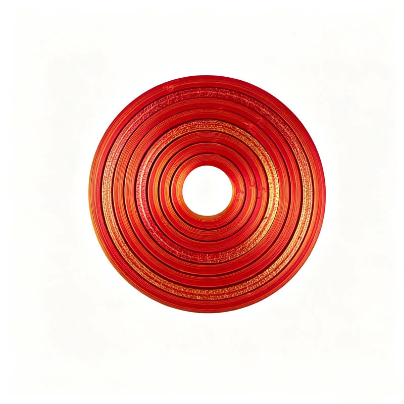 A close-up view of a red rotating ball spinner fidget toy with concentric rings.
