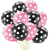 Un ramo de globos de látex negros y rosas con lunares unidos.