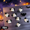 A variety pack of 50 Halloween resin nail charms featuring white ghost shapes with black bat wings on a clear display board.
