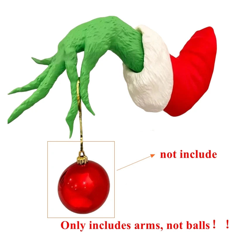 Funny monster arm wall decor featuring green and red arms with a red ornament.