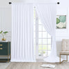 White wrinkle-free polyester backdrop curtains hanging in a doorway