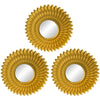A set of three gold sunflower wall mirrors with oval mirrors for home decor