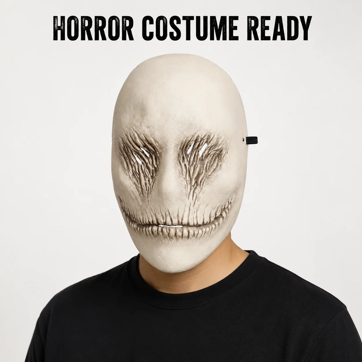 A realistic sculpted white ghost face mask with detailed facial lines and a black strap, ready for costume use.