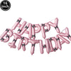 A set of pink foil letter balloons spelling out HAPPY BIRTHDAY for a party decoration.