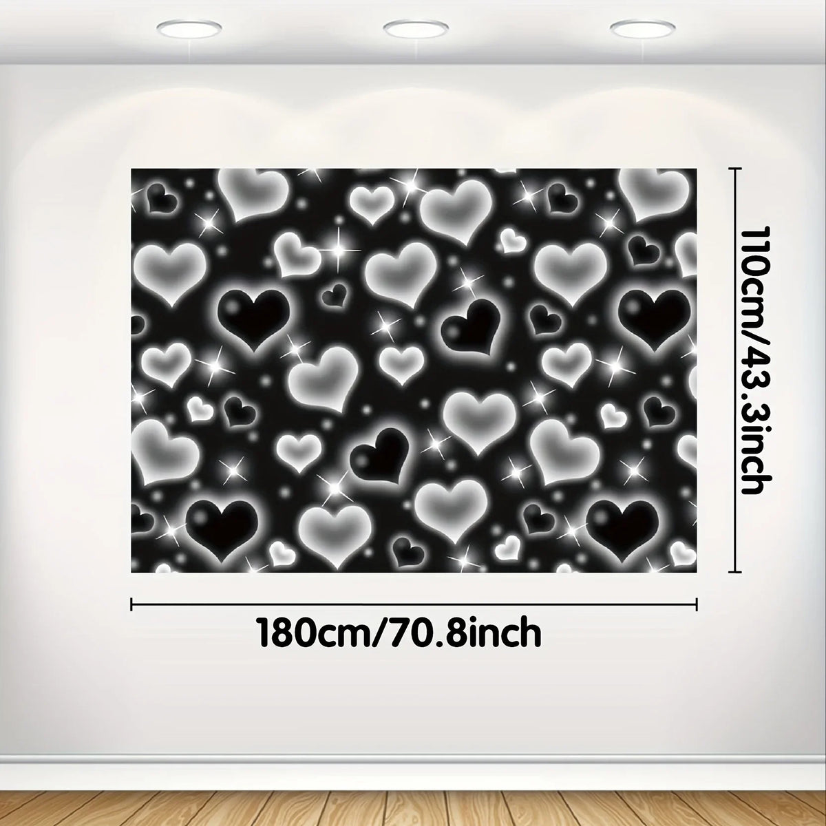 A rectangular photo backdrop featuring a pattern of glittering heart shapes on a dark background.