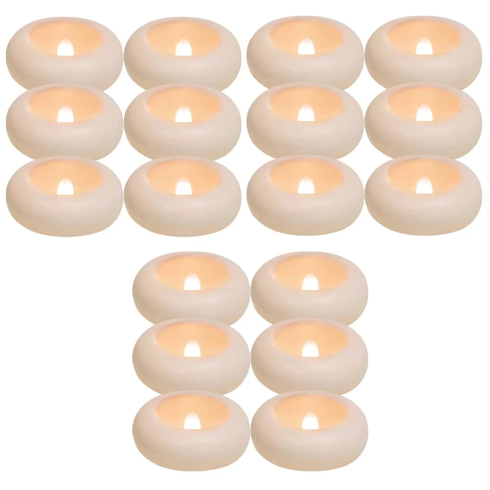 A set of ten waterproof floating LED candles with a warm white glow.
