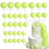 A set of light green foam cake toppers, including various sizes and shapes, displayed against a white background.