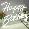 A glowing neon sign spelling out Happy Birthday on a white background.