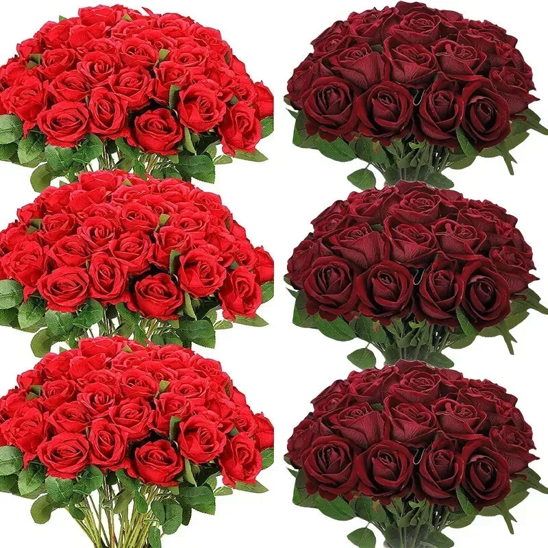 A collection of deep red and burgundy velvet artificial roses in bouquets for weddings and home décor.