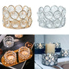 A set of romantic crystal tealight candle lantern holders in gold and clear glass.