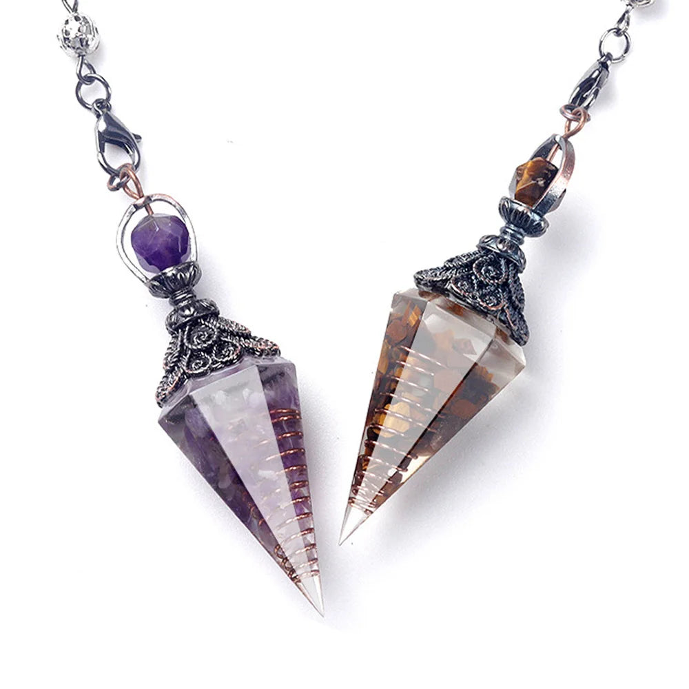 A natural crystal pendulum necklace set featuring purple and amber-colored stones suspended on silver chains.
