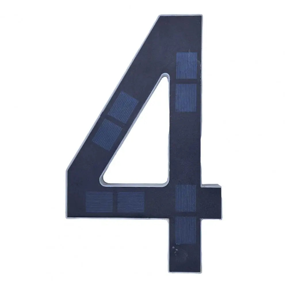 A dark blue solar LED house number sign shaped like the numeral four with integrated lighting cells.