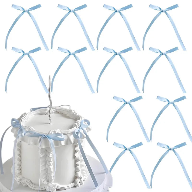 Set of light blue ribbon bow cake toppers in a coquette style
