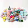 A collection of handmade crocheted turtle plush toys in various pastel and earthy colors.