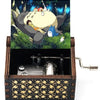 Hand-cranked wooden music box featuring a Totoro design with characters in a forest setting.