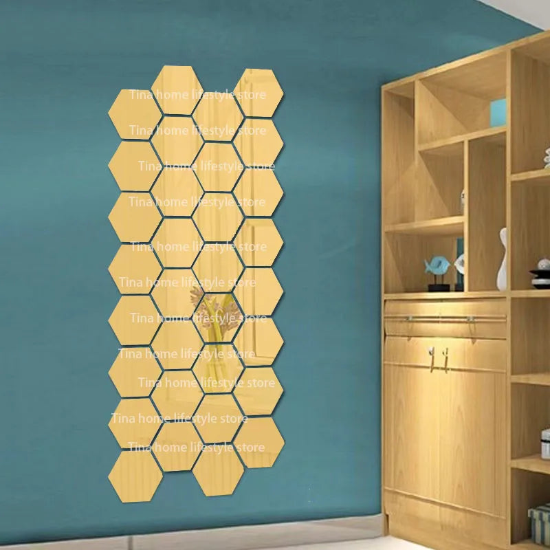 A vertical arrangement of 12 self-adhesive hexagon mirror wall decor stickers in a light wood tone mounted on a teal wall.
