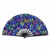 A folding rave hand fan with a vibrant pattern of iridescent blue, purple, and green butterfly shapes.