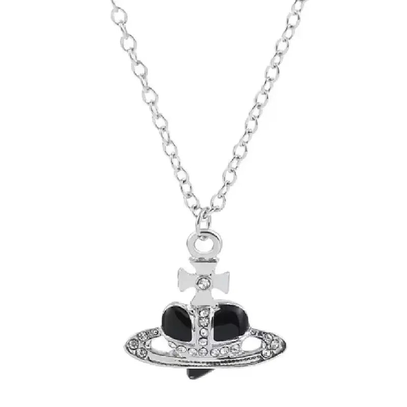 Silver pendant necklace featuring a diamond-inlaid Saturn design.