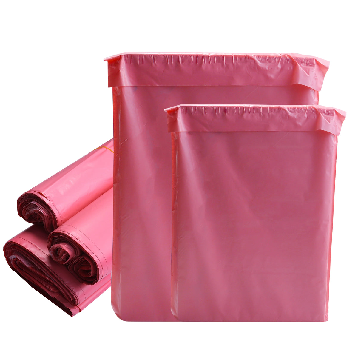 A bulk pack of pink plastic self-adhesive shipping pouches stacked and laid out.