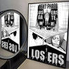 A canvas print featuring characters and text from the Blue Lock anime, including 'NEXT PHASE' and 'LOSERS'.