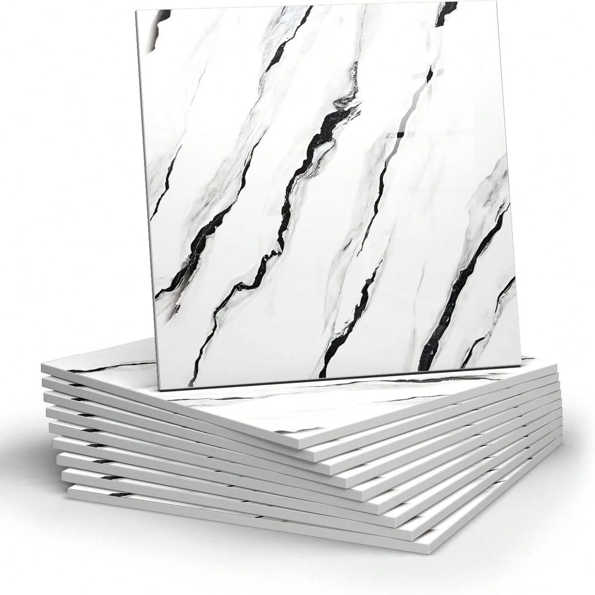 A stack of white marble peel-and-stick wall panels featuring black veining, displayed on a white surface.