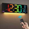 A large digital wall clock displaying 12:30 with an RGB mood light, shown above a hand holding a remote control.