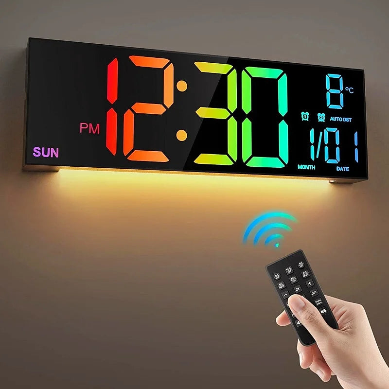 A large digital wall clock displaying 12:30 with an RGB mood light, shown above a hand holding a remote control.
