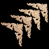 A set of two light-colored oak wood corner carvings featuring intricate European branch and crown designs.