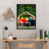 A framed photo of a couple holding hands, resting their heads on each other outdoors, displayed on a gray wall above a wooden