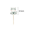 A cute baby elephant cake topper with a stick, shown next to a measurement of 4.5cm.