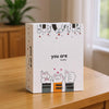 A white box featuring cartoon illustrations of hands and the text you are lovely for a photo album.