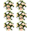 A set of six rose ball centerpieces featuring silk artificial flowers in shades of peach and white.