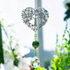 Silver crystal tree of life pendant with green and clear gemstone drops