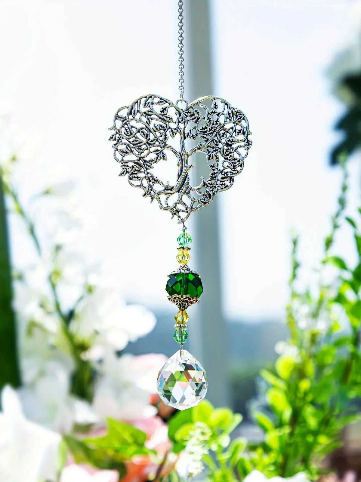Silver crystal tree of life pendant with green and clear gemstone drops