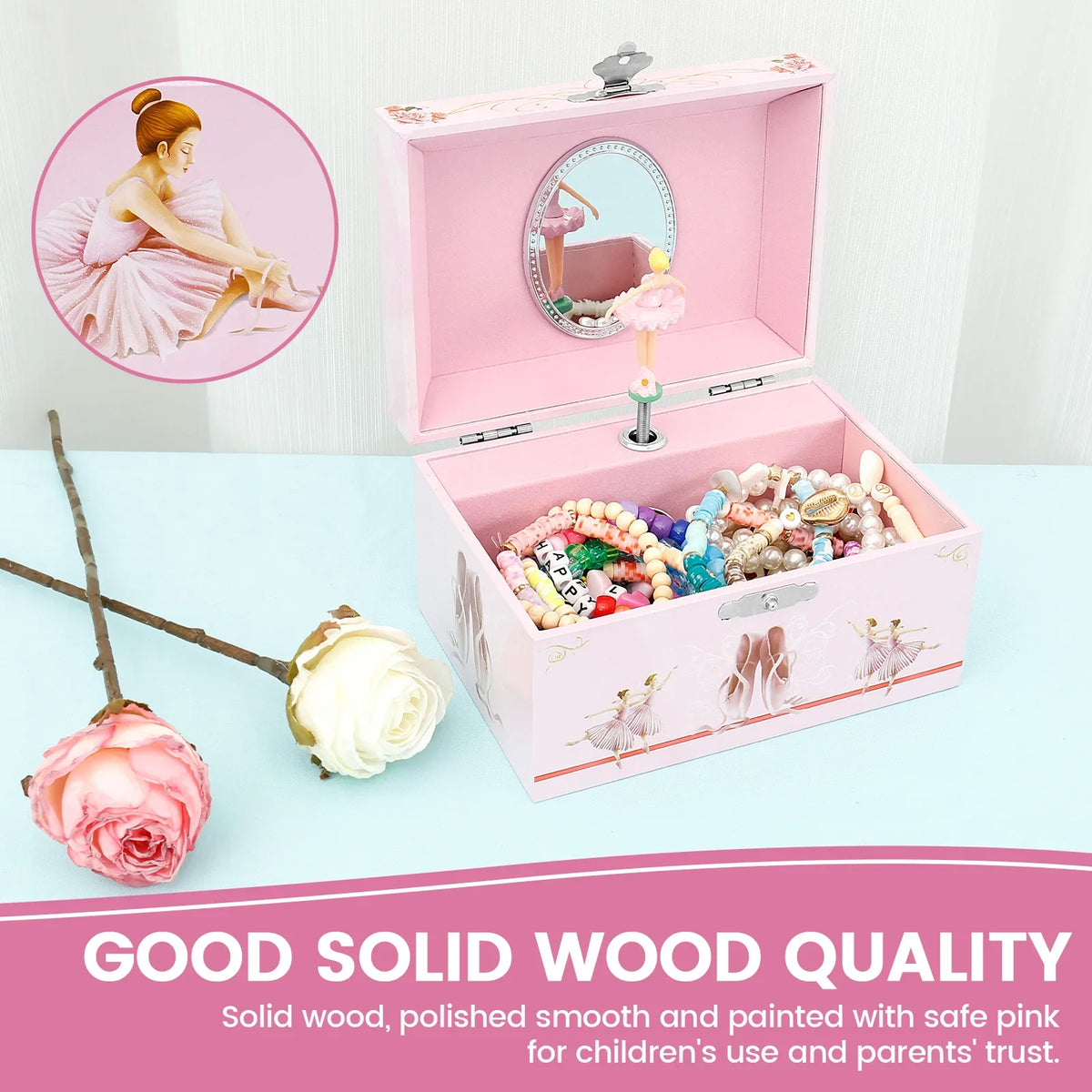 Pink wooden jewelry box with a mirror and compartments filled with colorful beads and a small figurine.