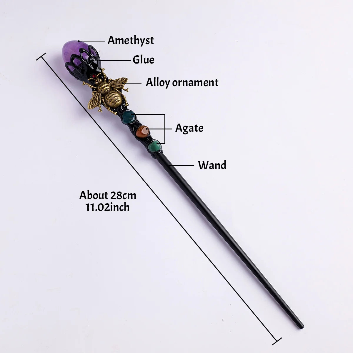 A crystal scepter featuring an amethyst gemstone, alloy ornament, and agate beads on a dark wand.