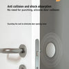 Close-up of a silver door handle and lock mechanism on a white door, with an orange warning circle visible.