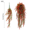 A cascading arrangement of red and green silk morning glory vine flowers used for home decor.