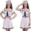 A woman models a white dress and hat set with black accents, featuring a captain's theme.