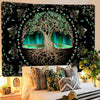 A dark tapestry featuring a large tree silhouette with glowing green leaves and sparkling blue accents against a black backgr