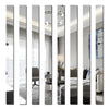 A set of vertical acrylic mirror strips used as wall stickers for modern home decor.