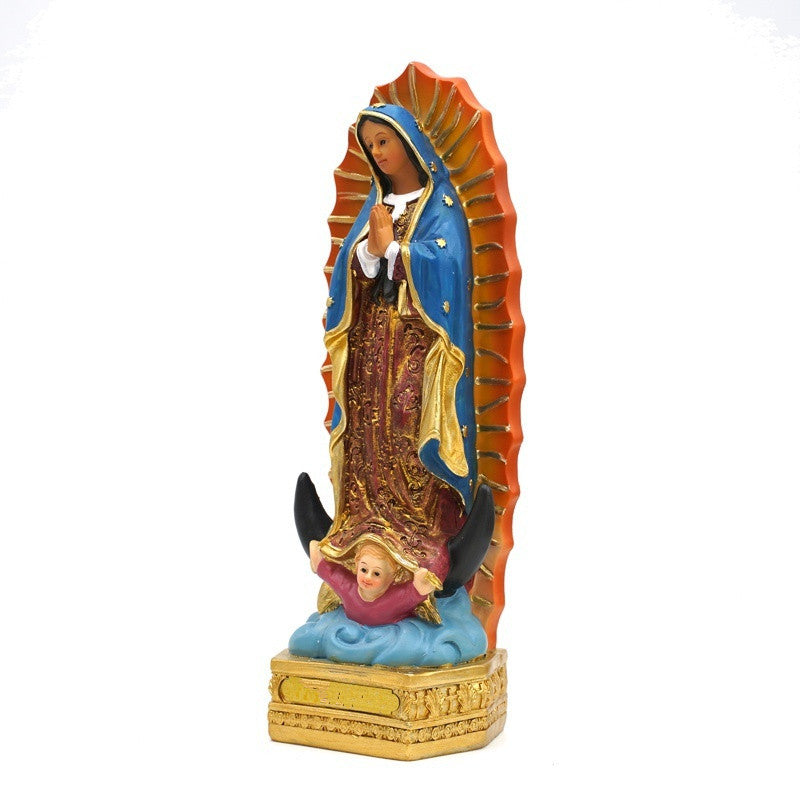 Hand-painted resin statue of Our Lady of Guadalupe with a blue mantle and golden rays.