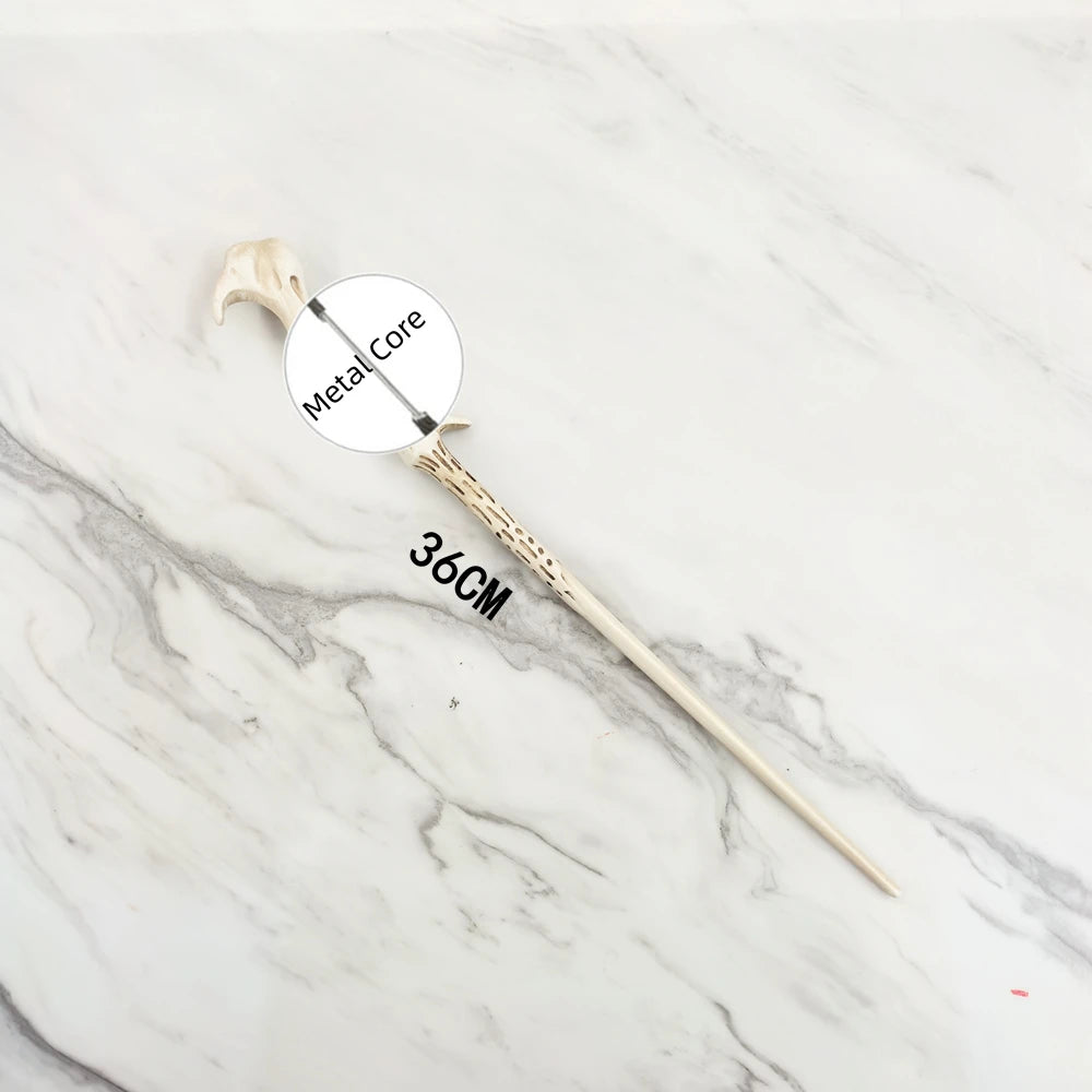 A replica metal magic wand with a wooden handle and a metal core displayed on a marble surface.