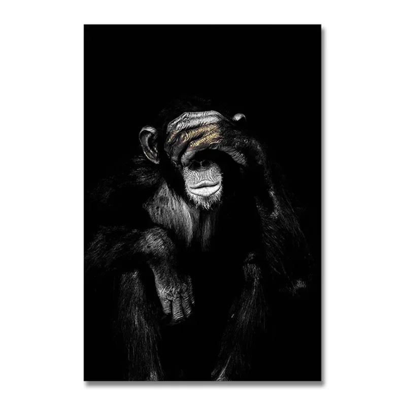 A black and white portrait of a monkey with intense eyes against a dark background.
