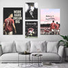 A gallery wall featuring three motivational canvas prints of football athletes with text like Work Hard Dream Big and Never G