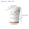 A white paper cup with gold lettering that reads Hello Baby